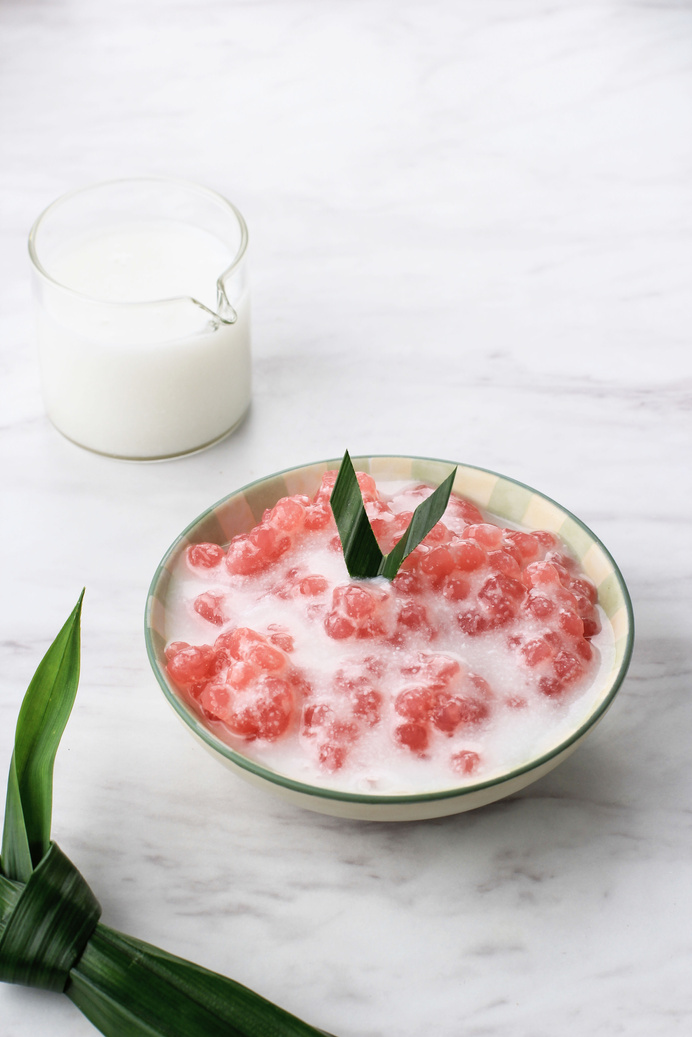Bubur Pacar Cina or Bubur Sagu Mutiara, Indonesian Traditional Dessert Made from Boiled Sagoo or Tapioca Pearl Served with Coconut Milk. Popular Served During Ramadan for Breakfasting.