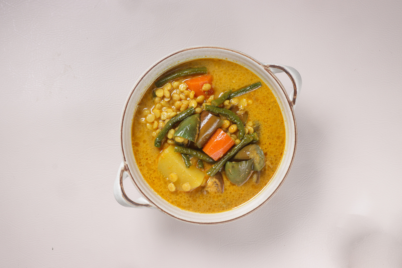 Dalca Sayur or Vegetables Dalca is a Stewed Vegetables Curry with Lentils, Famously Served with Briyani or Tomato Rice.