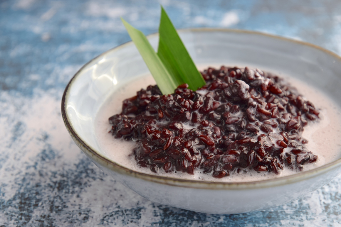 Bubur Ketan Hitam, Indonesian dessert. Black glutinous rice porridge with coconut milk, palm sugar and pandan leaf.